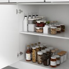 two white shelves filled with different types of spices and condiments on top of each other