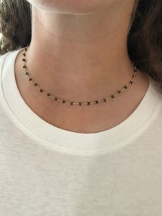 we love our rosary beads soooo much so we had to make a choker! these are simple, cute & available in turquoise and black. -1 rosary bead choker in your choice of color (15 inch)every piece of jewelry is handcrafted and/or assembled at bubs & sass. we pay a lot of attention to detail and want our customers to be happy! please reach out if we haven't accomplished this. all of our products are nickel and lead free.thank you for choosing bubs & sass. we are so very grateful. Dainty Black Beaded Chain Necklace, Adjustable Black Wire Wrapped Beaded Necklace, Adjustable Black Wire Wrapped Beaded Necklaces, Adjustable Dainty Black Choker, Dainty Adjustable Black Beaded Jewelry, Dainty Black Beaded Necklace With Round Beads, Dainty Black Beaded Necklace, Black Wire Wrapped Choker Jewelry, Adjustable Black Choker With Tiny Beads