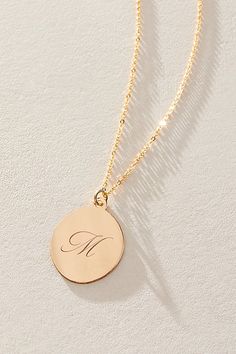 Just as effortless as it is elegant, this stunning necklace features an oval pendant with gorgeous cursive engraved initial for the ideal finishing touch. * 14k Gold Filled chain * Personalized, laser engraved, 14k Gold Filled 17x22mm oval pendant * Length: 20" * 5 days of production | Set & Stones Personalized Amelia Necklace at Free People in Gold Elegant Personalized Initial Necklace For Formal Occasions, Formal Round Necklace With Initials, Elegant Pendant Initial Necklace Tarnish Resistant, Elegant Initials Charm Necklace, Elegant Gold Initials Necklace, Elegant Personalized Oval Pendant Necklace, Elegant Personalized White Gold Initial Necklace, Elegant Oval Engraved Necklace, Elegant Gold Initial Pendant Name Necklace