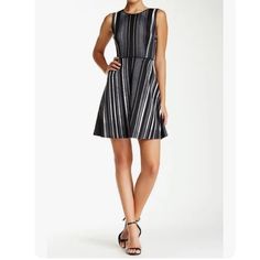 Andrew Marc New York Black Gray Vertical Stripes Sleeveless Dress Great Fir The Summer Or Casual Outing. Fit And Flare Crew Neck Open Back With Banded Construction Hidden Side Zipper Unlined 95% Polyester 5%Spandex Size 4 Approx. Measurement Are Shown In The Photos New With Tags Black Sleeveless Fit And Flare Mini Dress, Black Fit And Flare Sleeveless Mini Dress, Flattering Sleeveless Black Mini Dress, Black Sleeveless Mini Dress Lined, Black Sleeveless Mini Dress With Lining, Sleeveless Black Mini Dress, Gray Sleeveless Mini Dress For Night Out, Black Lined Sleeveless Dress For Spring, Gray Sleeveless Dress For Date Night