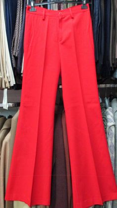 "Amazing original 70s red flared pants. Deadstock.NOS 70s flared trousers. Made in Italy by \"Campus-Sportwear\" (pic.5). Gabardine fabric. High waist and belt loops (pic.2). No pockets. Mint conditions. They fits size XS-S about 4 US EU 36/38 Measurements: (lay flat and double waist and hips) Waist 27.5\" - 70 cms hips 34.5\" - 88 cms rise 10.2\" - 26 cms inseam 32.1\" - 81,5 cms bottom width 11.4\" X 2 - 29 cms X 2 In order to avoid any unpleasant misunderstandings please read carefully all th Fitted Red Wide Leg Pants For Fall, Retro Fitted Wide Leg Flare Pants, Retro Fitted Wide-leg Pants, Retro Red Pants For Workwear, Retro Red Pants For Work, Fitted Red Wide Leg Pants, Vintage Red Pants For Fall, Vintage Red Fitted Bottoms, Red Fitted Vintage Bottoms