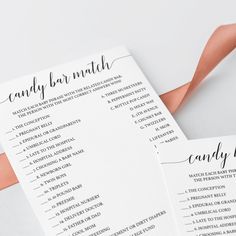 two wedding program cards with pink ribbon and matching font on the front one is for candy bar match