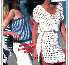 two beautiful women walking on the beach in crochet dresses and hats, one is holding her hand