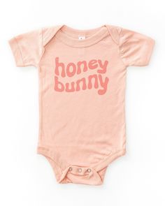 Heather peach short sleeve toddler shirt with coral pink retro wavy print Easter Baby Announcement, Toddler Girl Tees, Baby Easter Gifts, Baby Easter Outfit, Bodysuit Short, Baby Girl Outfit, Body Suit With Shorts