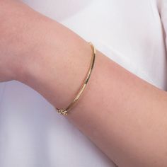 Solid Gold K14 Squared Bangle Bracelet,Simple Real Gold Bangle Everyday Jewelry.This trendy bracelet will bring a minimalist,modern and fashion touch to your look.Elegant and simple in its design and therefore such a favorite piece and so easy to stack with other bracelets and bangles. Home page https://www.etsy.com/shop/ByGema ♥♥Jewelry Certification Guarantee carats of products. ♥♥ CUSTOMIZATIONS Please don't forget to select your size carefully. -> IMPORTANT Please keep in mind that the color Minimalist Round Gold Bracelet For Everyday, Everyday Minimalist Polished Chain Bracelet, Minimalist Formal Bracelet With Simple Design, Minimalist Round Gold Bracelet Tarnish Resistant, Dainty Bracelets With Polished Finish For Everyday Wear, Minimalist Yellow Gold Bangle Name Bracelet, Minimalist Yellow Gold Name Bangle Bracelet, Minimalist Tarnish Resistant Gold Bracelet, Everyday Minimalist Gold Bracelet