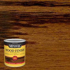 minwax wood finish paint in dark brown, with an orange and yellow tint