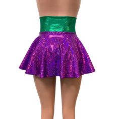 Our newest skirt style! We are in love with this lace-up, open-front mini skirt in purple and green holographic spandex with gold ties/laces. The tie-up front offers an adjustable fit and the skirt is light and airy.This mardi gras corset skirt is perfect for your party or event! The gold holographic cheeky shown in the photo is sold separately in our shop. Fitted Skirt For Costume Party During Party Season, Stretch Skirt For Club, Pink Rave Party Bottoms, Pink Rave Bottoms For Party, Fitted Purple Bottoms For Party Season, Stretch Skirt For Spring Costume Party, Fitted Metallic Mini Skirt With Lining, Rave Bottoms For Spring Night Out, Spring Rave Bottoms For Night Out