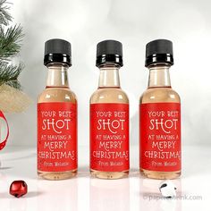 three bottles with christmas message on them