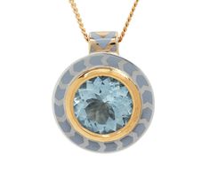 With its stunning, hand-painted design and cool toned color, this captivating Alice Cicolini necklace is a statement-making take on the traditional colored stone pendant. The round, sky blue aquamarine shimmers from the center of the 22K yellow gold bezel at the center of the sterling silver cupped pendant where it is framed in a gray lacquer design. The back of the pendant is painted with a blue geometric floral design and it hangs from the 14K yellow gold bale at the center of the 18K yellow g Luxury Light Blue Necklace For Gift, Luxury Aquamarine Pendant Necklace, Luxury Aquamarine Yellow Gold Jewelry, Luxury Round Aquamarine Jewelry, Luxury Blue Topaz Round Jewelry, Luxury Round Blue Topaz Jewelry, Luxury Blue Medallion Jewelry, Luxury Blue Round Pendant Necklace, Luxury Aquamarine Gemstone Necklaces