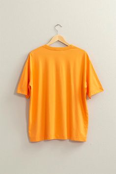 Experience style and comfort with our Violet Oversized T-Shirt! Made with a soft off-white fabric, this shirt features a fashionable oversized fit and a beautiful Orange color. Perfect for any occasion, this shirt will elevate your wardrobe and make you feel confident and stylish. Lorax Costume, The Lorax, Oversized T Shirt, White Fabric, White Fabrics, Oversized Tshirt, Feel Confident, Make You Feel, Orange Color