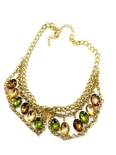 Collectible gold with rhinestone statement necklace. Gold Crystal Rhinestone Necklace With Chain, Crystal Rhinestone Necklace With Adjustable Chain, Elegant Gold Bib Necklace With Adjustable Chain, Gold Bib Necklace Costume Jewelry, Gold Rhinestone Necklaces For Party, Gold Costume Jewelry Bib Necklace, Formal Gold Rhinestone Necklace With Adjustable Chain, Glamorous Gold Metal Necklace, Gold Metal Bib Necklace With Adjustable Chain