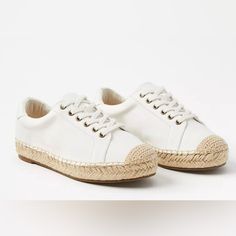 Loft Espadrille Lace-Up Tennis Shoes Canvas Sneakers White & Jute 9.5 Nwot. Never Worn. Have Been Stored For A While And The Soles Weren't Worn Outside. That Is Just How It Looks. Plenty Of Life Left For You To Enjoy. Runs Tts, Imo. This Style Of Sneaker Is Sold By Other Brands Like Lucky, Tretorn, And Tory Burch. Loft's Version Has The Same Adorable Look And Function But At A Fraction Of The Cost. White Canvas With A Natural Color (I Put Tan) Jute Toe And Jute Along The Side On A Comfy 1" Platf Spring Canvas Shoes With White Laces And Round Toe, Spring Sneakers With White Laces And Round Toe, Spring Sneakers With White Laces, White Canvas Shoes With Textured Sole For Summer, Summer White Canvas Shoes With Textured Sole, White Lace-up Sneakers With Woven Sole, White Canvas Shoes With Cushioned Footbed For Spring, White Canvas Shoes With Contrast Sole For Spring, Espadrille Sneakers