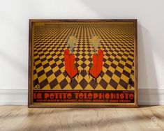 an old poster with two red chairs in the middle of a checkered floored room