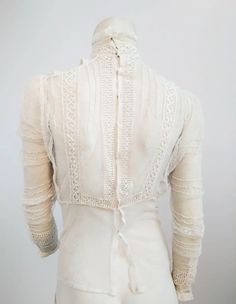 1900s White Lace Sheer Mesh Blouse For Sale at 1stDibs Elegant Fitted Victorian Dress For Vintage Fashion, Elegant Cotton Lace Top With Lace Collar, Elegant Cotton Lace Top, Fitted Regency Victorian Dress With Lace Collar, White Fitted Lace For Vintage Events, Fitted Lace Top With Lace Sleeves For Daywear, Elegant Cotton Lace Daywear Top, Fitted Victorian Dress With Lace Collar, Fitted White Victorian Lace