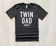 Twin Dad Shirt >> Black Heather - Cotton and Polyester Blend >>Fits exceptionally true to size **Distressed/Vintage print >> Our designs are printed directly into the garment for a soft, vintage feel that will last a lifetime. >> Most items ship between 2-5 business days. Love this tee? Check out our entire Men's collection! https://www.etsy.com/shop/CrazyGrateful?ref=simple-shop-header-name&listing_id=949421073§ion_id=32321067 Click here to check out our entire shop! https://www.etsy.com/shop/C Casual Fitted Tops For Father's Day, Fitted Casual Tops For Father's Day, Papa Shirts, Papa Shirt, Funny Gifts For Dad, Funny Dad Shirts, Dad Bod, Gifts For New Dads, Custom Tees