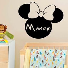 a mickey mouse wall decal with the word mama on it