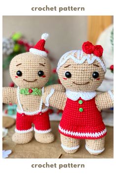 two crocheted dolls standing next to each other