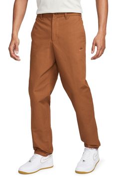 Classic and comfortable, these versatile cotton chinos feature a relaxed, straight-leg fit that makes them an ideal go-to for any occasion. 32" inseam; 16 1/2" leg opening; 13" front rise; 16" back rise (size 32) Zip fly with button closure Front slant pockets; back welt and button-welt pockets 100% cotton Machine wash, tumble dry Imported Cotton Chinos, Welt Pockets, Welt Pocket, Straight Leg, Nordstrom, Nike