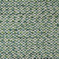 an upholstered green and white fabric textured with small squares in varying shades