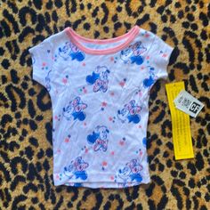 Disney Junior Minnie Floral Short Sleeve Tee. Nwt. White With Pink Trim. Blue And Pink Floral And Minnie Print. 12 Months No Flaws. Smoke And Pet Free. Next Business Day Shipping. Cotton Minnie Mouse Top For Playtime, White Character Print Top For Sleepovers, Disney Cotton Tops For Playwear, Casual Minnie Mouse Tops For Playtime, Cute Character Print Tops For Sleepovers, Fitted Character Print Tops For Playwear, Casual Character Print Tops For Sleepover, Fitted Tops With Character Print For Playwear, White Disney Tops For Summer