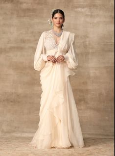 Ridhi Mehra-Ivory Peplum With Draped Ruffle Saree-INDIASPOPUP.COM Desi Attire, Ridhi Mehra, Ruffle Saree, Saree Trends, Stylish Sarees, Indian Wedding Outfits, Indian Designer Outfits, Saree Look, Designer Dresses Indian