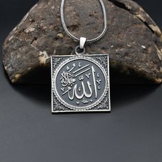 Allah Engraved Necklace, 925 Sterling Silver Necklace, Religious Silver Necklace, Handmade  Necklace ✦ Details ✦ * Material: 925 Sterling Silver * Weight of pendant : 6,30  gram *  Chain Weight :     20 Inches = 5.00 Gr     22 Inches = 5.60 Gr     24 Inches = 6.05 Gr     26 Inches = 6.10 Gr     28 Inches = 6,40 Gr * Sides oxidized * Stamp: 925 ✦ Shipping ✦ * Processing time: 1-3 business days. * This item ships from my Turkish workshop in Istanbul. * Add your phone number in address box for a sm Classic Silver Necklace With Large Pendant, Classic Silver Engraved Necklace, Sterling Silver Engraved Square Pendant, Stamped 925 Pendant Charm Necklace As Gift, Stamped 925 Silver Pendant Charm Necklace For Gift, Sterling Silver Hallmarked Pendant Necklace, Engraved Sterling Silver Square Pendant Jewelry, Gift Charm Necklace With Stamped 925 Pendant, Stamped 925 Charm Pendant Necklace For Gift