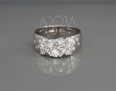 a wedding ring with three diamonds on it