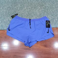 Nwt Men's Size Xl Nike Dri-Fit Aeroswift Running Shorts. They Have The Built In Underwear Support, Slits On The Sides, And 2 Small Pockets Along Inside Waistband. Color Is A Periwinkle (A Blueish Purple/Purplish Blue). Inseam Approx 2.25" Purple Athletic Shorts With Pockets For Sports, Sporty Purple Athletic Shorts With Pockets, Nike Purple Athletic Shorts For Sports, Purple Moisture-wicking Running Bottoms, Purple Moisture-wicking Bottoms For Running, Nike Stretch Athletic Shorts In Purple, Stretch Purple Nike Athletic Shorts, Nike Purple Athletic Stretch Shorts, Casual Purple Running Bottoms