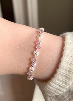 A beautiful handmade bracelet with an alternating flower and vine pattern, available in silver or gold and they come in a variety of colours. This bracelet makes the perfect gift for any occasion, and gives a magical vibe to any outfit! The crystals have a stunning iridescent effect, and can be seen in slightly different colours depending on the lighting and angle. They are all reflective so that they glisten and sparkle beautiful colours in the light to give a true magical feeling to the wearer Vine Bracelet, Handmade Gifts For Women, Fantasy Jewellery, Women Nature, Handmade Fairy, Vine Pattern, White Bracelets, Beautiful Colours, 24kt Gold