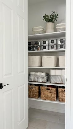 an organized pantry with baskets and containers