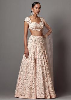 750 hours of handwork in lehenga with pearls and silver embellishments paired with hi-shine beaded blouse and dupatta. 100% handwork only. Ash Pink, Rahul Khanna, Pink Victorian, Pink Lehenga, Beaded Blouse, Nehru Jackets, Western Wedding, Wedding Service, Short Suit