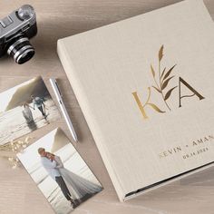 a wedding album with two photos and a camera next to it