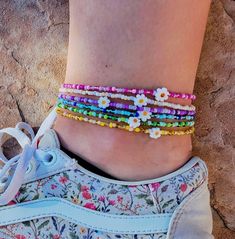 Our 'Daisy Seed Bead Anklets' are Made with Acrylic Seed Beads and Hypoallergenic Findings! Perfect for Everyday Wear and Easy Styling! Adjustable White Anklets For Spring, Trendy Spring Festival Anklets, Spring Anklets With Colorful Beads, Handmade Trendy Anklets For Spring, Trendy Handmade Anklets For Spring, Colorful Beaded Anklets For Spring Gift, Handmade Adjustable Anklets For Spring, Spring Gift Anklets With Colorful Beads, Casual Tiny Beads Bracelets For Spring