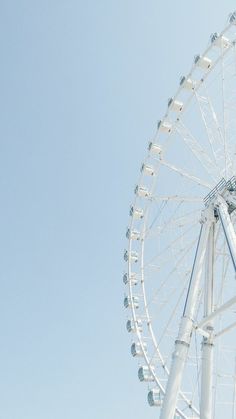 a large ferris wheel on a clear day