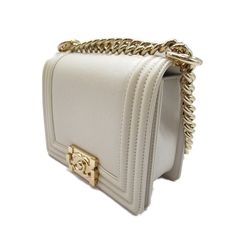 This Mini Boy Bag features a White Leather. Assured Product ity: This product is supplied by a renowned and trusted partner. With this purchase you are preserving iconic craftsmanship celebrating heritage and embracing the beauty of sustainable shopping. Border Box, Chanel Mini, Sustainable Shopping, Timeless Handbag, List Style, Japan Fashion, Bags Designer Fashion, Exclusive Bag, Fendi Bags