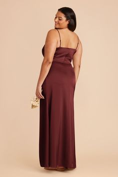 Steal the show in this chic matte satin bridesmaid gown, complete with an asymmetric neckline and column wrap slit skirt. Available in Cabernet. Experiment with modern cuts in our Jennifer dress. Crafted in matte satin, this style has an asymmetrical neckline for a chic (and unique) look. | Cabernet Bridesmaid Dress Matte Satin Size XS | Birdy Grey Jennifer Berry Bridesmaid Dresses, Copper Bridesmaid Dresses, Satin Bridesmaids Gowns, Terracotta Bridesmaid, Mulberry Bridesmaid Dresses, Classic Bridesmaids Dresses, Convertible Bridesmaid Dress, Rose Bridesmaid Dresses, Bridesmaid Dresses Strapless