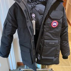 Nwt, In Box With Hanger And Garment Bag. Real Fur Hood Trim. Black Expedition Parka Women’s Size Xs. I Am Also Interested In Trading For An Xxs/Xs Canada Goose Women’s Bomber Jacket !! Black Outerwear With Logo Patch For Work, Canada Goose Expedition Parka, Canada Goose Chilliwack, Canada Goose Logo, Canada Goose Parka, Canada Goose Women, Waterproof Parka, Jacket Outfit Women, Parka Women