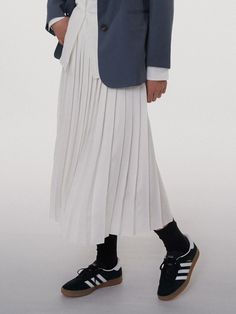 Editor's NotesThe Pleated Long Skirt exudes a serene mood with its calm pleats and subtle shine. It boasts a clean line without any unnecessary wrinkles, and a luxurious mood with ample length and pleats. It is made of a fabric with a moderate thickness, which is less transparent even without lining, and it is comfortable to wear as it boldly omits lining. It is made by blending viscose and modal appropriately, so you can feel a luxurious shine and soft texture. It has an open and closing zipper placed on the side, allowing you to feel a slim fit, and has a closure ring to close it securely. It is proposed in two colors: white and dark navy, which are good for wearing in spring and fall due to their thickness.-Serene mood with calm pleats and subtle shine-Clean and neat line without any un White Long Skirt, Pleated Long Skirt, White Skirts, Spring And Fall, Dark Navy, Long Skirt, Slim Fit, Skirt, Clothes For Women