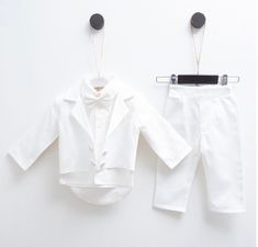 Classy and trendy boys outfit for your little man .We prepare each product with care and love for our work. *Baptism , christening or dedication outfit *Special event outfit *Long sleeve shirt and long pants.Pants has an elastic waisband Care instruaction Machine wash 65 to 85 F ( 30 degrees ) Elegant White Baptism Dress For First Birthday, White Elegant Baptism Dress For First Birthday, White Cotton Sets For Baptism, White Cotton Baptism Sets, White Sets For Baptism In Spring, Cotton Baptism Sets, White Spring Sets For First Communion, White Cotton Formal Sets, Baby Boy White Outfit