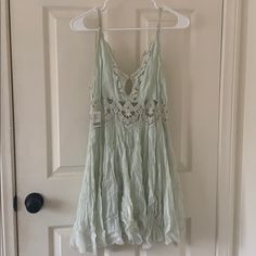 Never Worn Light Blue V Neck Dress From Free People With Tags. Floral Lace Detail And Keyhole Front. Spring Green Mini Dress With Lace Trim, Green Mini Dress With Lace Trim For Summer, Casual Green Mini Dress With Lace Trim, Light Blue Flowy Dress, Blue V Neck Dress, Blue Flowy Dress, Dancing Dresses, Hawaii Dress, Blue Hawaii