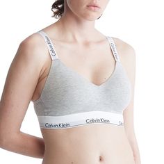 A Calvin Klein icon. This modern cotton bralette is the definition of effortless. Made with super soft and supple cotton stretch blended with modal, this women's Calvin Klein bralette offers all day comfort. A Calvin Klein icon. This modern cotton bralette is the definition of effortless. Made with super soft and supple cotton stretch blended with modal, this women's Calvin Klein bralette offers all day comfort.Click on this INTIMATES & SLEEPWEAR Guide to find the perfect fit and more! Wireless Calvin Klein Store, Calvin Klein Bralette, Cotton Bralette, Bra Size Charts, Lounge Lingerie, Plus Size Bra, Free Style, Calvin Klein Woman, Sporty Look