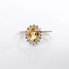 Natural Citrine Ring, Engagement Ring, Cubic Zirconia Ring, 925 Sterling Silver, Gift For Her, Promise Ring, November Birthstone Ring Specifications :- ❥ Stone - Natural Citrine ❥ Stone Size - 5x7mm  ❥ Cut Type - Oval ❥ Side Stones- Simulated diamonds Cz ❥ Ring Size: I offer more than one (Contact us if your ring size is not available in the listing) ❥ Color: Silver, Gold, Rose Gold, White Gold or Black Rhodium ❥ Material : 925 Sterling Silver, 14K/18K/22K Solid Gold --> ❥ Makes a Wonderful Gift Citrine Ring Engagement, November Birthstone Ring, Mystic Topaz Ring, Citrine Ring, Citrine Stone, Cubic Zirconia Rings, Natural Citrine, November Birthstone, Zircon Ring