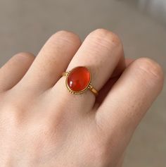 Refer pictures for more details  Can be used as ring or single use as a pendant  Comes with 18K gold ring band and a 18K gold necklace ! Formal Gold Carnelian Ring, Formal Carnelian Gold Ring, Yellow Gold Oval Cabochon Moonstone Ring, Classic Yellow Gold Carnelian Jewelry, Classic Carnelian Yellow Gold Jewelry, Fine Jewelry Cabochon Ruby Ring In Yellow Gold, Yellow Gold Carnelian Oval Cabochon Ring, Carnelian Yellow Gold Rings With Oval Cabochon, Fine Jewelry Ruby Ring In Yellow Gold With Cabochon