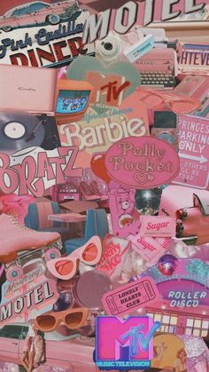 a pile of assorted pink and white items on top of each other with the word barbie above them