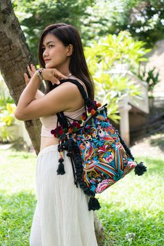 "The beautiful bag is made with an amazing piece of fabric woven by the HMONG hill tribes of (Northern Thailand). Its a great bag for carrying anything. It features a zippered opening area and inside zippered pocket. We buy materials from Hmong market and we design and sew by hand. Some of the bags we modify to improve the product. The Hmong tribes live in the North of Thailand Item Specifics Approximately Length : 13\" (INCH) Height : 14\" (INCH) Straps : 24\" (INCH) N.B. YOU MAY NOT RECEIVE TH Ethnic Bag, Romantic Goth, Embroidered Tote Bag, Bohemian Bags, Northern Thailand, Embroidered Tote, Bird Patterns, Fabric Bags, Style Profile