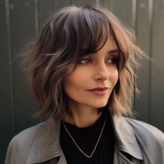 Textured Shaggy Bob with Side Swept Bangs scaled Bob With Heavy Fringe, Shag Bob With Bangs Straight Hair, Choppy Bob Side Bangs, Rocker Messy Fringe, Sharp Bob With Bangs, Medium Lob Haircut Textured Bob With Bangs, Short Hair With Bangs Side Part, Medium Bob Side Part, A Line Bob With Side Bangs