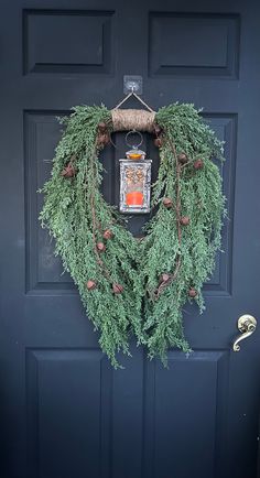 a wreath is hanging on the front door