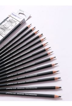 the 12 pencils are lined up next to each other