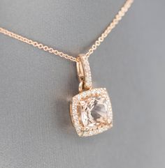 "Handcrafted Morganite and Diamond Halo 14k Rose Gold Pendant Necklace, Wedding Necklace, Bridesmaid Gift, Blush Pink Rose Gold, Gift for Her This sparkling handmade pendant necklace looks gorgeous in its rose gold setting, perfect for any occasion. The piece features a 2.70ct cushion Morganite as the main stone, which has a halo of 0.37ctw diamonds framing it. All stones are prong set in 14k rose gold, with small diamond accents on the gallery. The bale is locked in place so the pendant does no Rose Gold Wedding Necklace With Diamond Accents, Rose Gold Diamond Accent Wedding Necklace, Rose Gold Wedding Necklaces With Diamond Accents, Wedding Rose Gold Necklace With Diamond Accents, Refined Elegant Jewelry For Wedding, Yellow Gold Morganite Jewelry For Wedding, Rose Gold Diamond Cut Necklace For Wedding, Exquisite Formal Morganite Jewelry, Elegant Morganite Jewelry