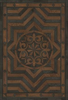 a wooden floor with an intricate design on the center and bottom part, in black and brown